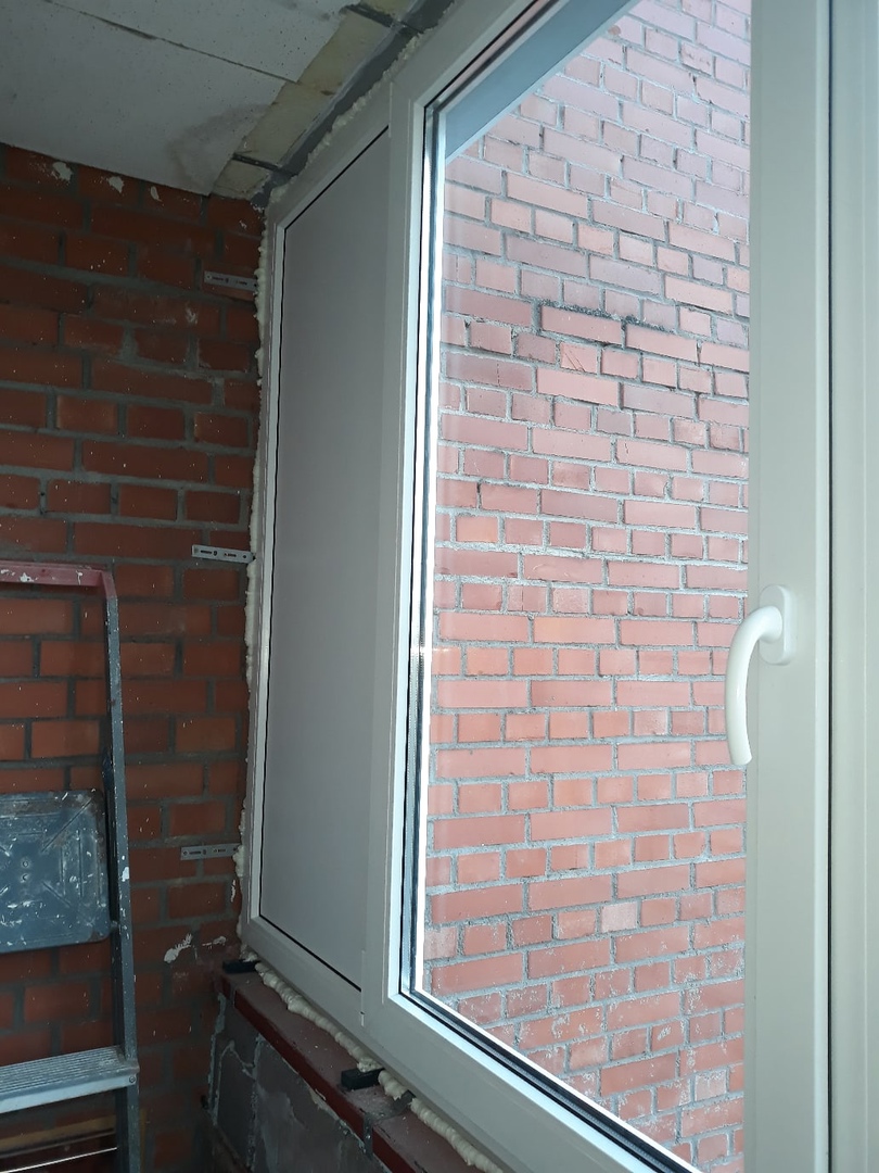 Окна Rehau Blitz (New) на балконе - фото 1